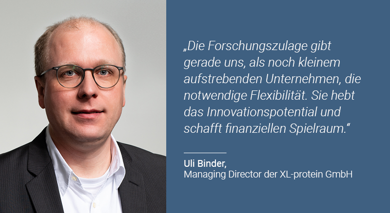 Bild von Uli Binder mit der Zitataufschrift: "Die Forschungszulage gibt gerade uns, als noch kleinem aufstrebenden Unternehmen, die notwendige Flexibilität. Sie hebt das Innovationspotential und schafft finanziellen Spielraum."